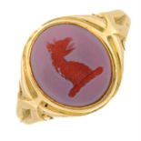A late Victorian 15ct gold sardonyx seal signet ring of a griffin head.