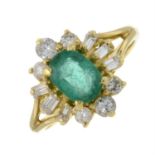 An 18ct gold emerald and vari-cut diamond cluster ring.