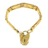 A 9ct gold expandable bracelet, with heart-shape lock clasp.