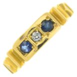 A late Victorian 18ct gold sapphire and diamond three-stone ring.