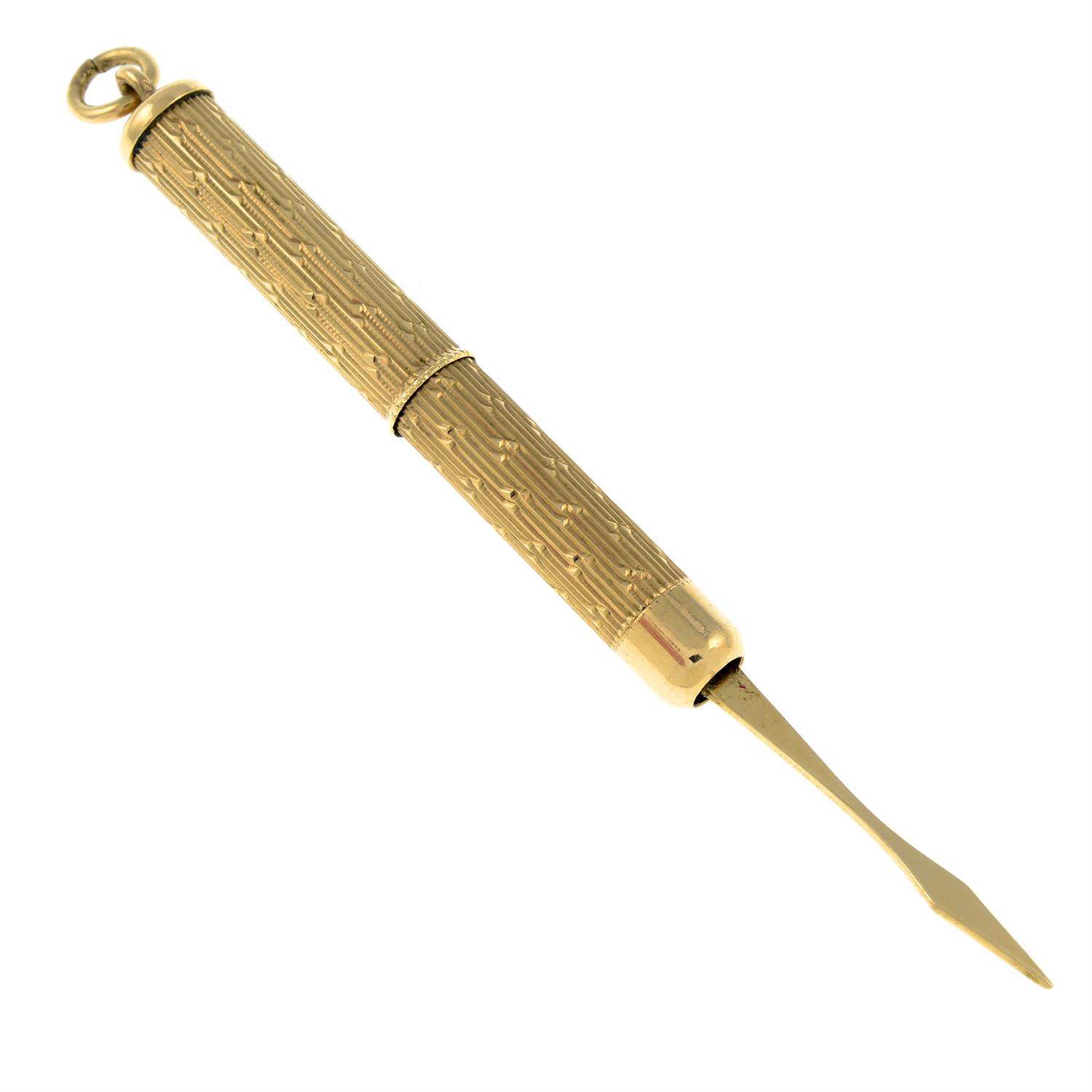 A 1970s 9ct gold retractable toothpick pendant. - Image 2 of 2