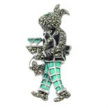 A plique-a-jour marcasite and emerald brooch of a hare serving drinks.