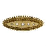 A late 19th century 15ct gold circular-cut diamond brooch.