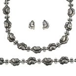 A 'Moonlight Grapes' necklace, bracelet and clip-on earring set, by Georg Jensen.