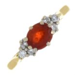 An 18ct gold fire opal and diamond ring.