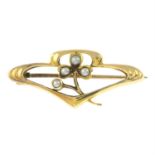 An early 20th century 15ct gold split pearl brooch with shamrock motif.