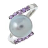 An 18ct gold cultured pearl and pink sapphire crossover ring.