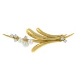 An 18ct gold diamond and cultured pearl brooch.