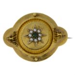 A late 19th century gold split pearl and emerald brooch.