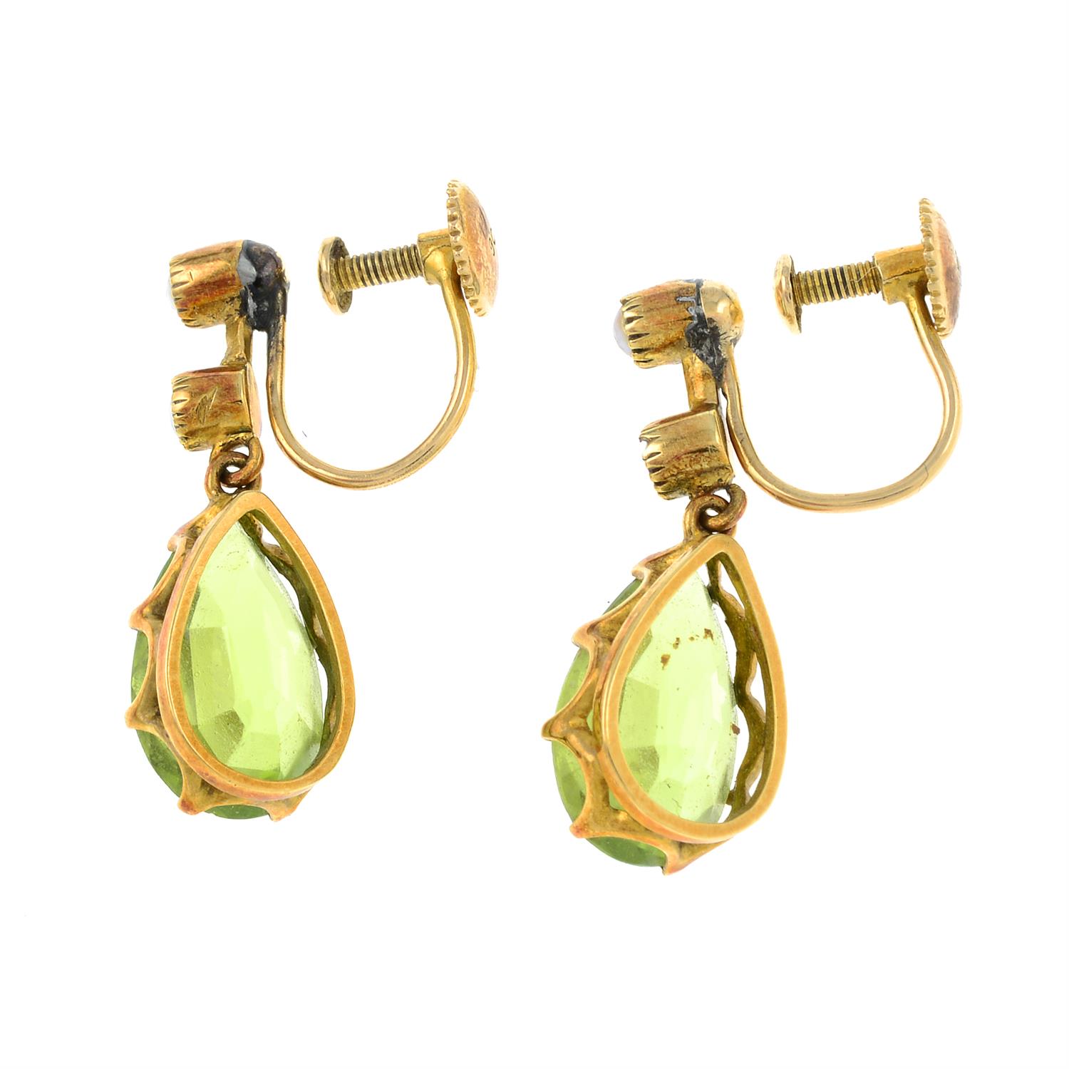 A pair of early 20th century 9ct gold peridot and split pearl earrings. - Image 2 of 2