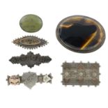Four late 19th century sweetheart brooches along with an agate and a serpentine brooch.