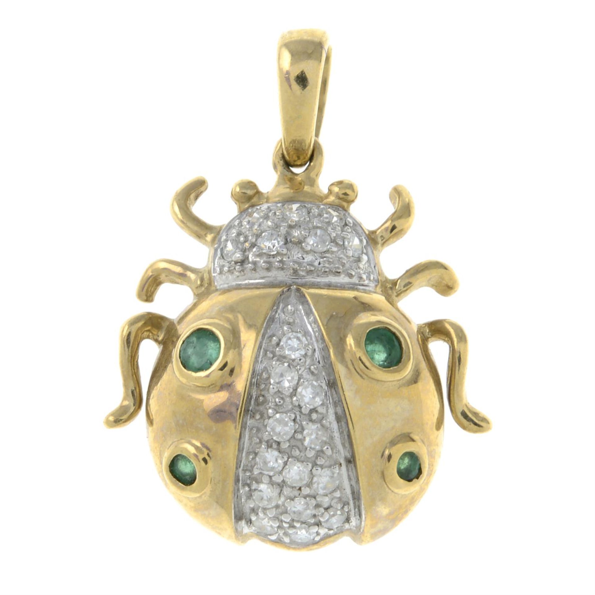 A 9ct gold emerald and brilliant-cut diamond ladybird pendant.