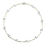 A 9ct bi-colour gold, wave-link necklace, with flat-link spacers.