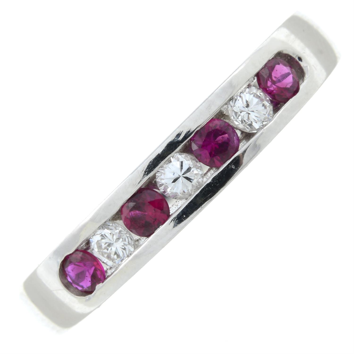 An 18ct gold diamond and ruby half eternity ring.