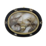 A late 19th century black enamel, diamond point and split pearl mourning brooch, with woven hair