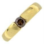An 18ct gold coloured diamond single-stone ring.