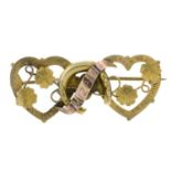 An late 20th century 9ct gold sweet heart brooch.