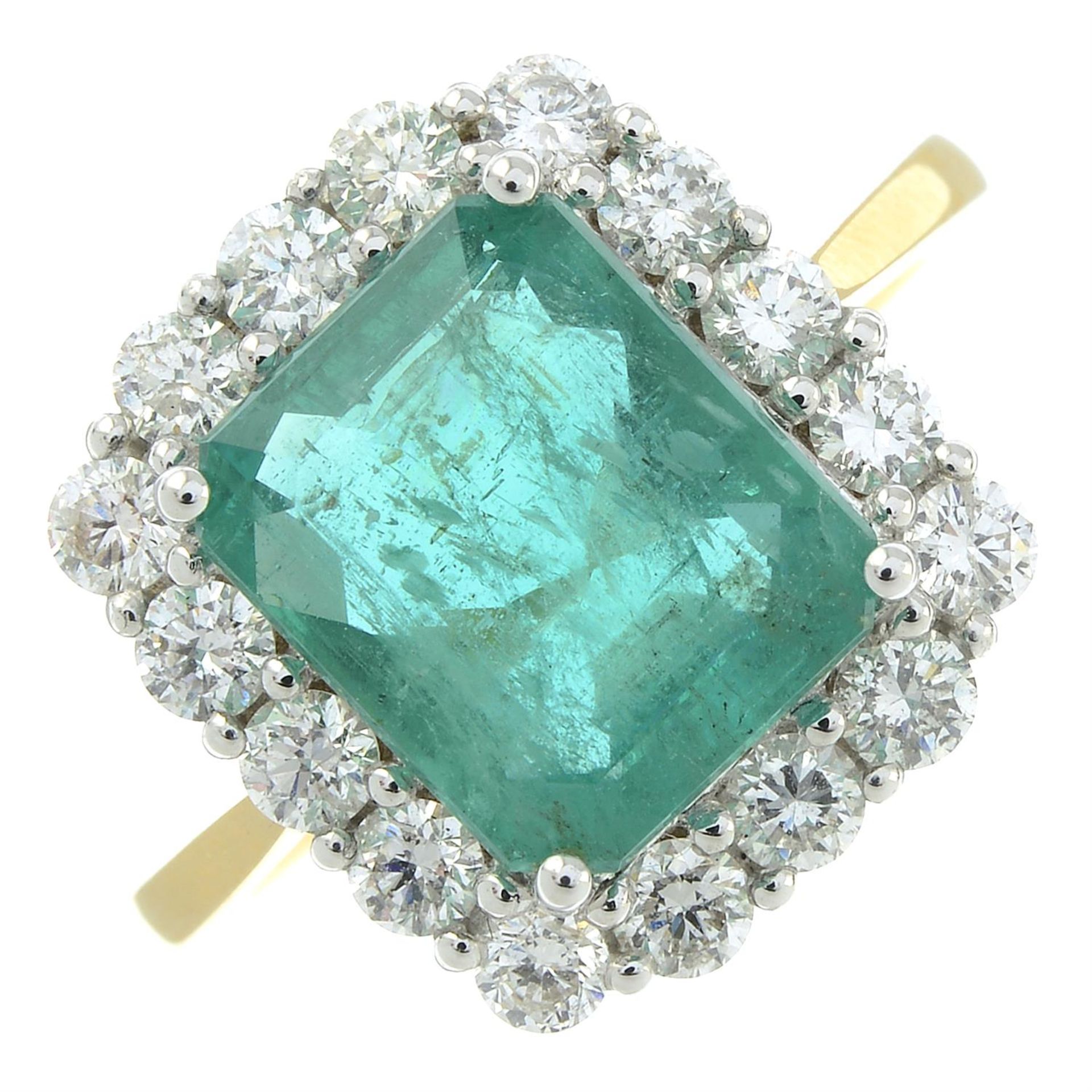 An 18ct gold emerald and diamond square-shape cluster ring.