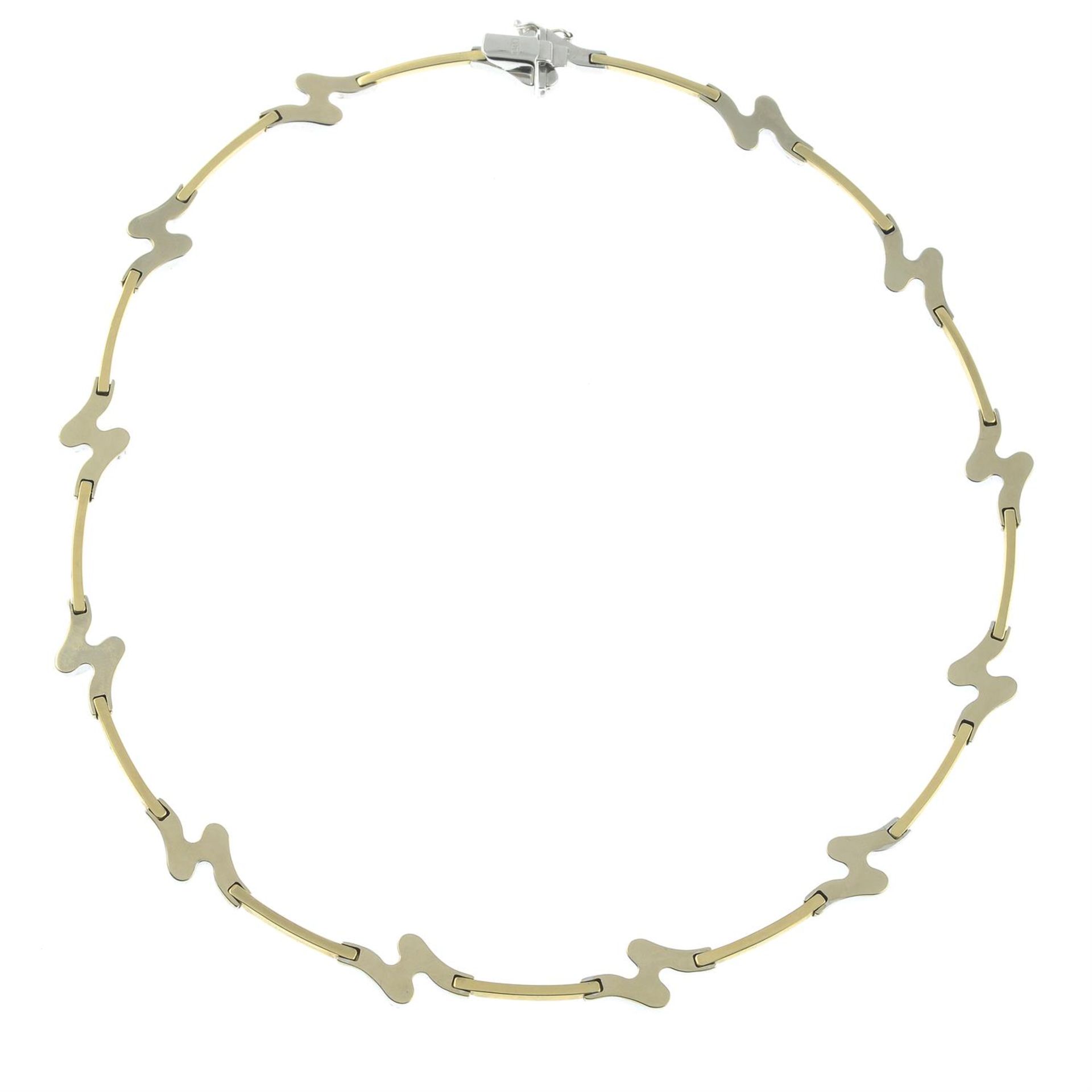 A 9ct bi-colour gold, wave-link necklace, with flat-link spacers. - Image 2 of 2