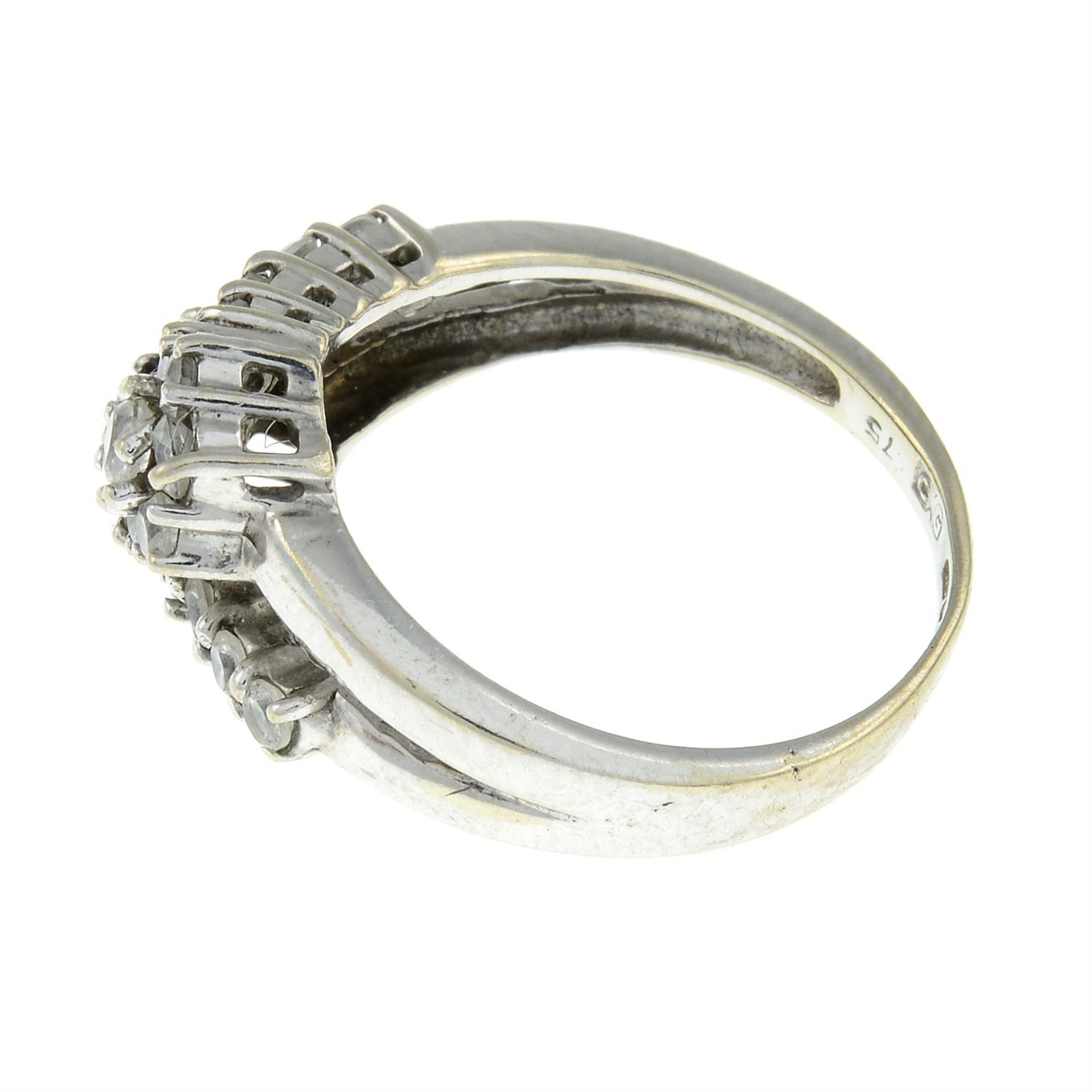 A 9ct gold cubic zirconia cluster crossover ring. - Image 2 of 3