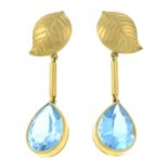 A pair of blue topaz and leaf motif drop earrings.