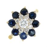 A sapphire and brilliant-cut diamond floral cluster ring.