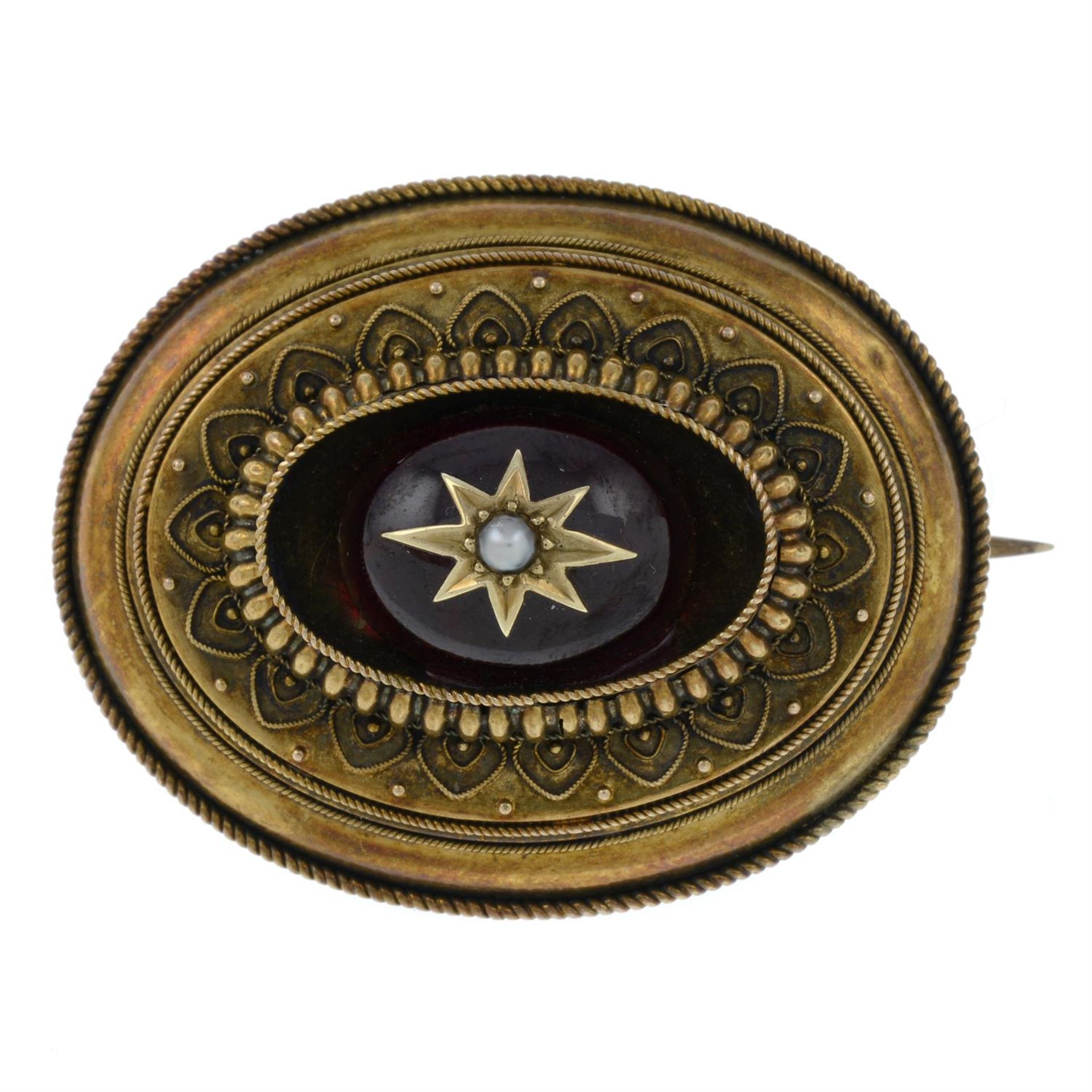 A late 19th century gold, garnet and split pearl brooch.