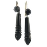 A pair of late 19th century carved jet mourning earrings.