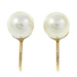 A pair of cultured pearl earrings.