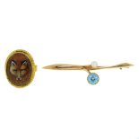 An early 20th century 15ct gold, blue zircon and seed pearl brooch and a later fox clasp.