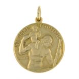 A 9ct gold pendant of St. Christopher.