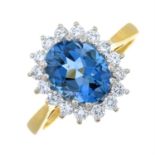 An 18ct gold topaz and brilliant-cut diamond cluster ring.