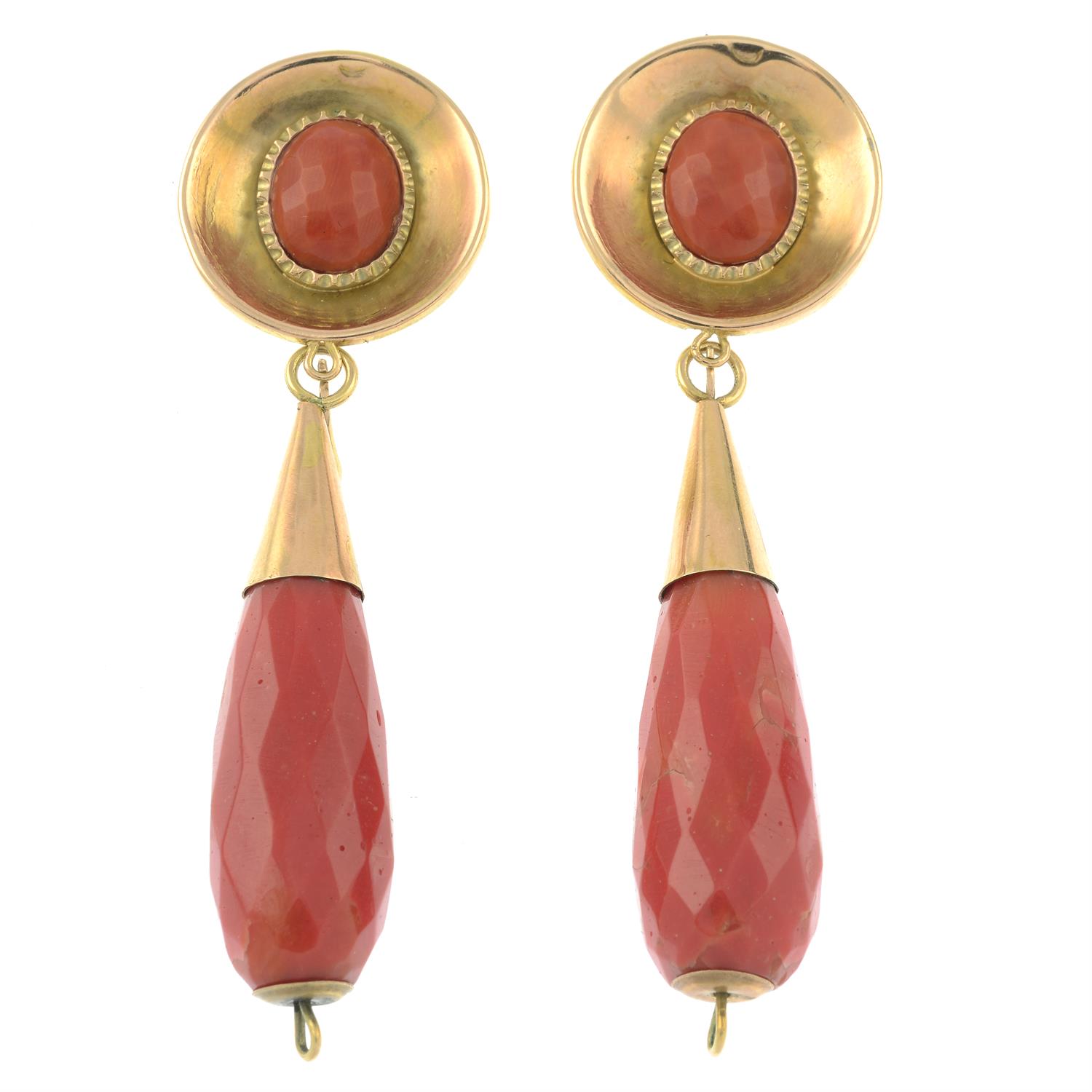 A pair of coral pendant earrings.