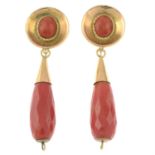 A pair of coral pendant earrings.