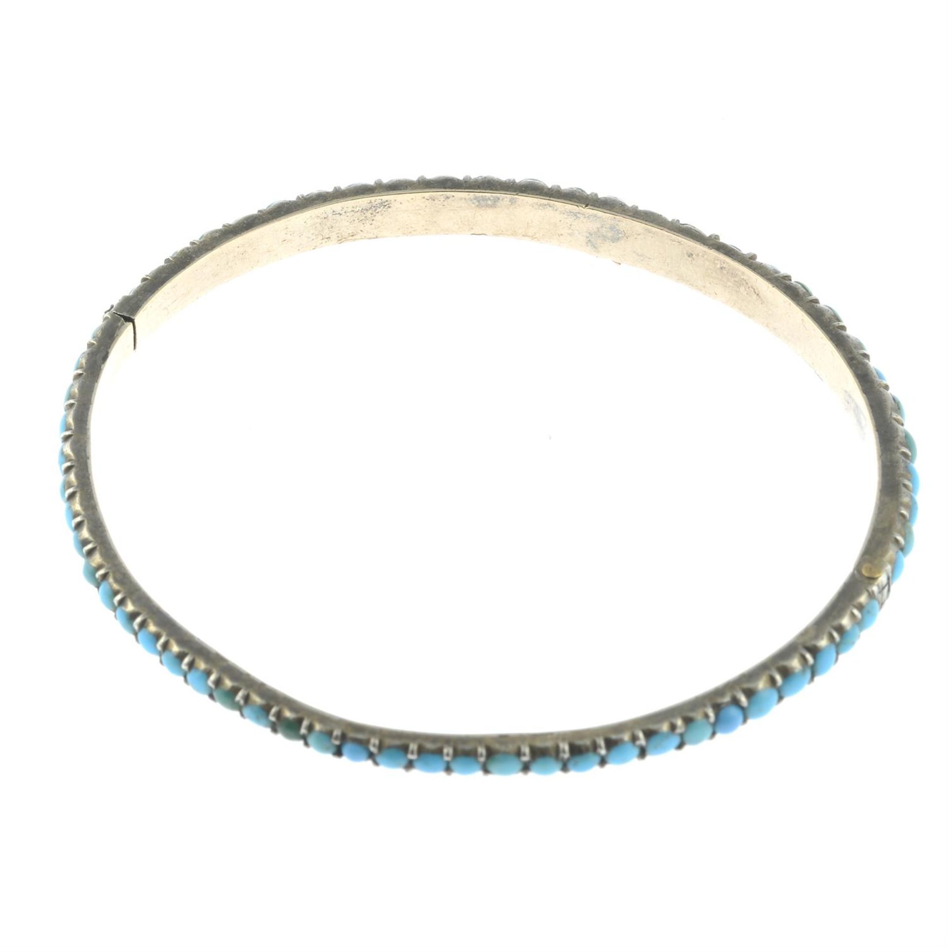 A late 19th century silver, turquoise hinged bangle. - Image 2 of 2