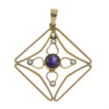 An early 20th century 9ct gold amethyst and split pearl pendant.