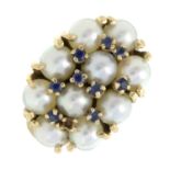 A cultured pearl and sapphire dress ring. AF.