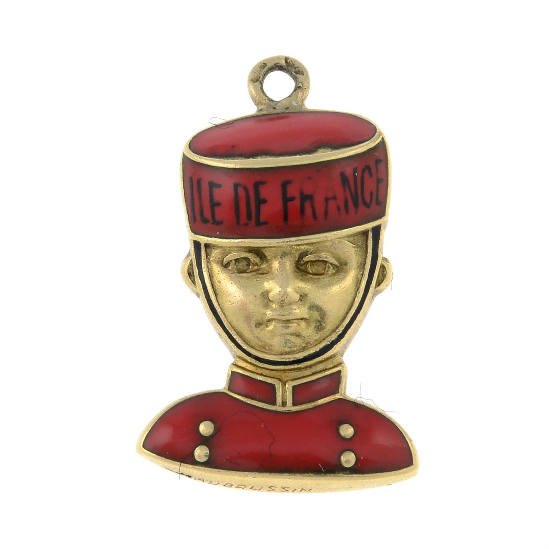 An enamel Île-de-France bell boy charm.