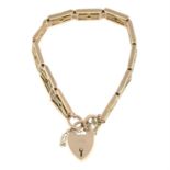 (26085) A mid 20th century 9ct gold bracelet, with heart-shape padlock clasp.