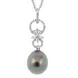 A cultured black pearl and diamond pendant with 18ct gold chain.