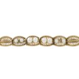 A 9ct gold cultured pearl openwork bracelet.