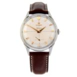 OMEGA - a Genève wrist watch.