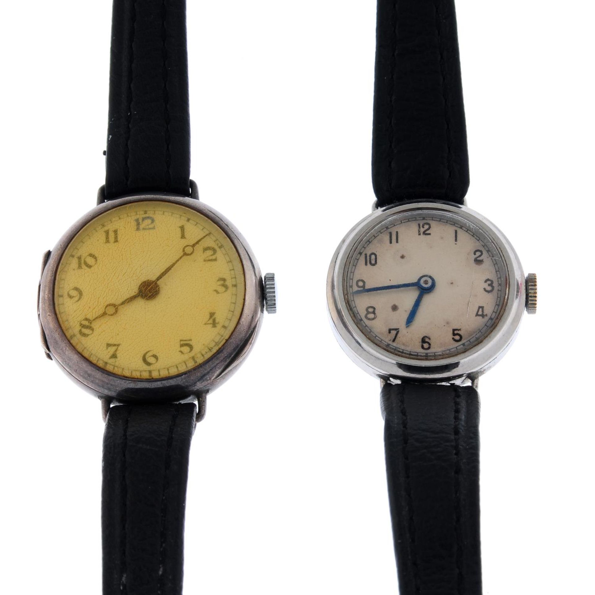 A trench style wrist watch.