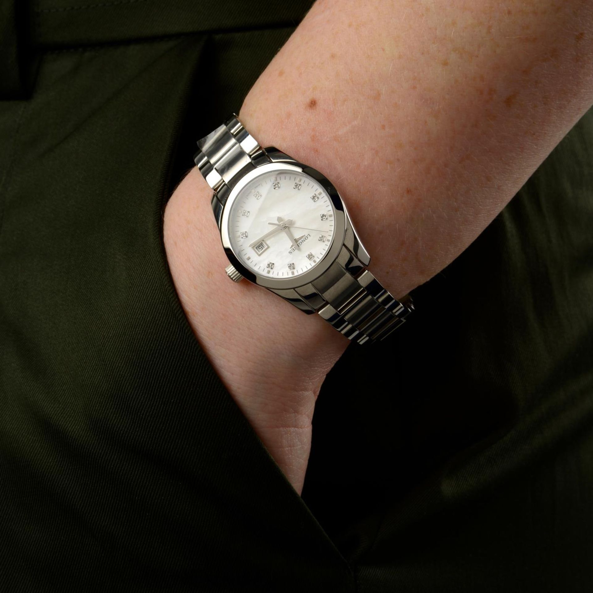 CURRENT MODEL: LONGINES - a lady's Conquest bracelet watch. - Image 6 of 6