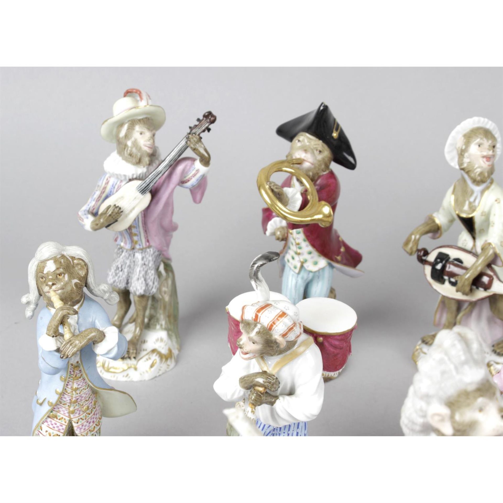 A group of ten porcelain monkey band figurines with Meissen style marks. - Image 4 of 5