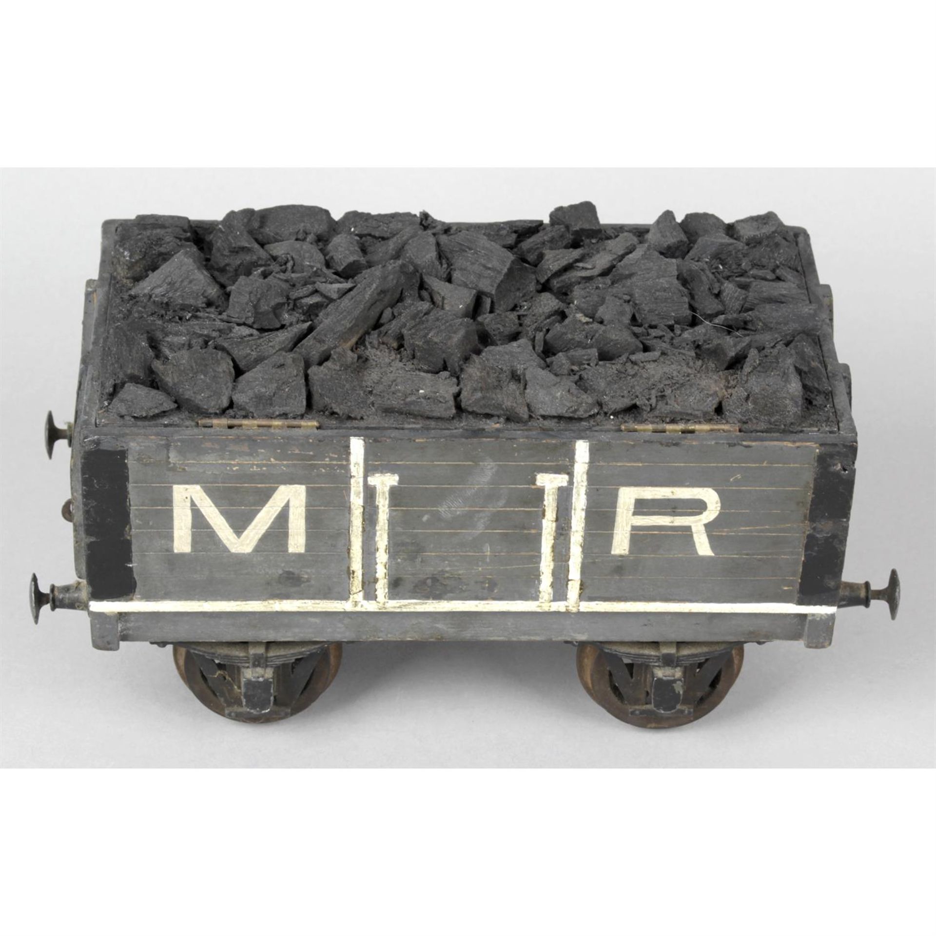 A late 19th Century painted wooden Humidor modelled as a Midland Railways Coal wagon.