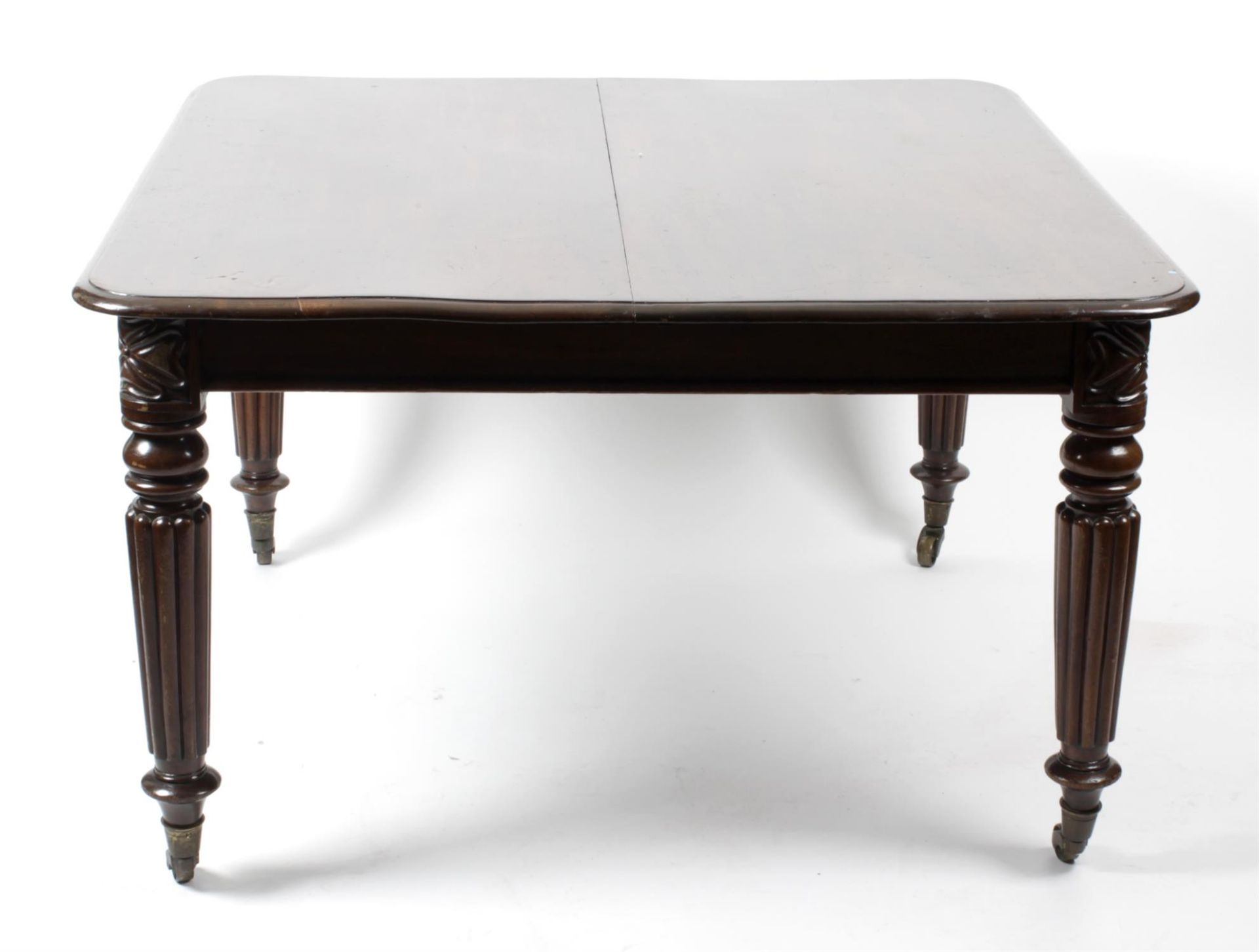 A Victorian mahogany extending dining room table.