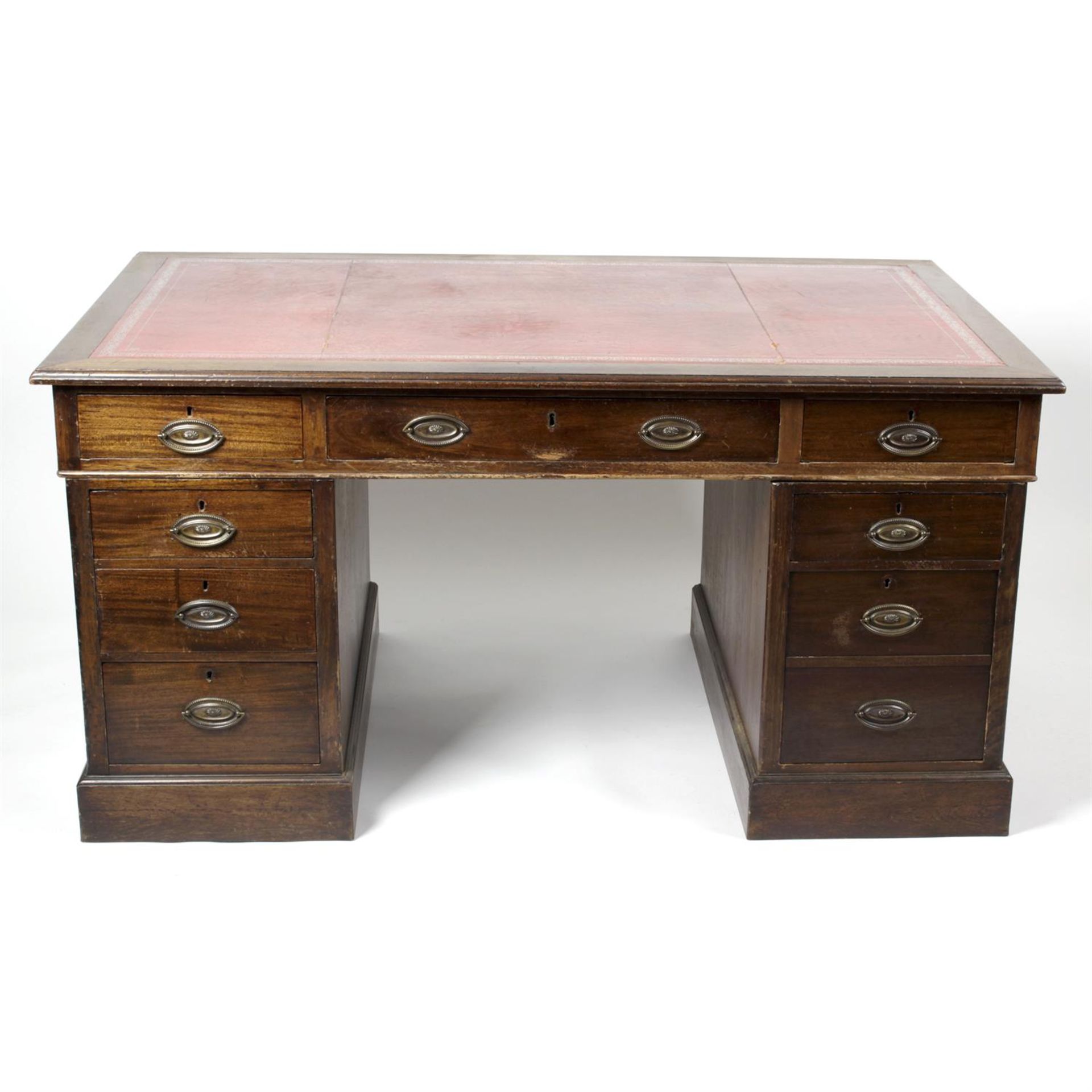 An early 20th century mahogany twin pedestal desk.