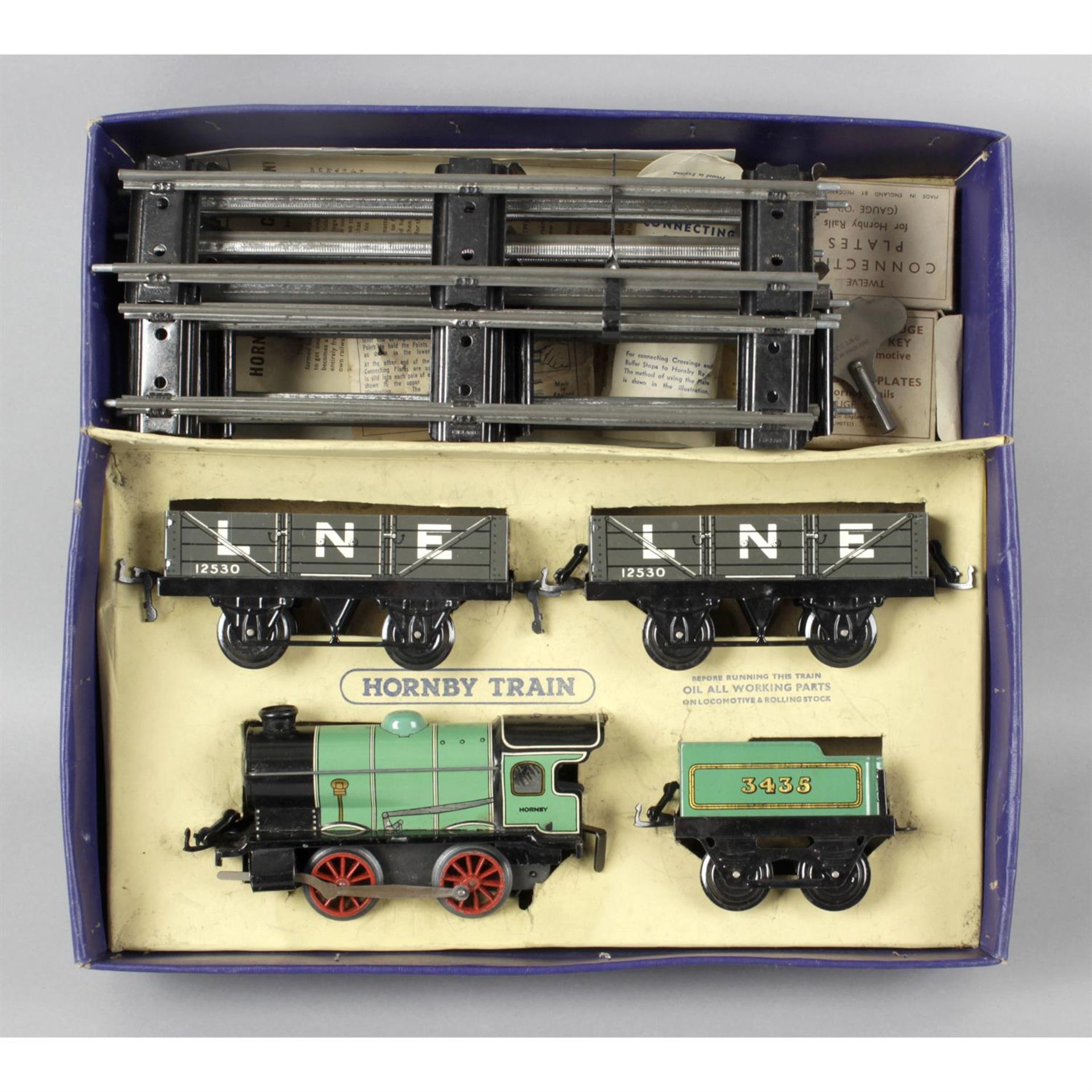 Hornby tinplate, clockwork O Gauge M1 model train goods set and other Hornby trains