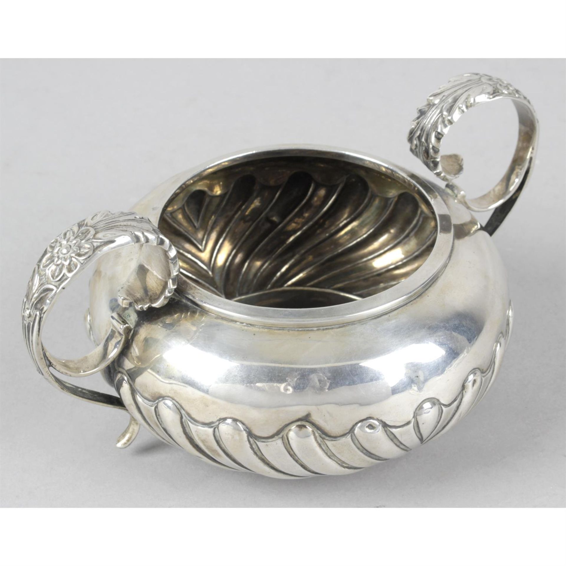 A George IV silver twin-handled sugar bowl.